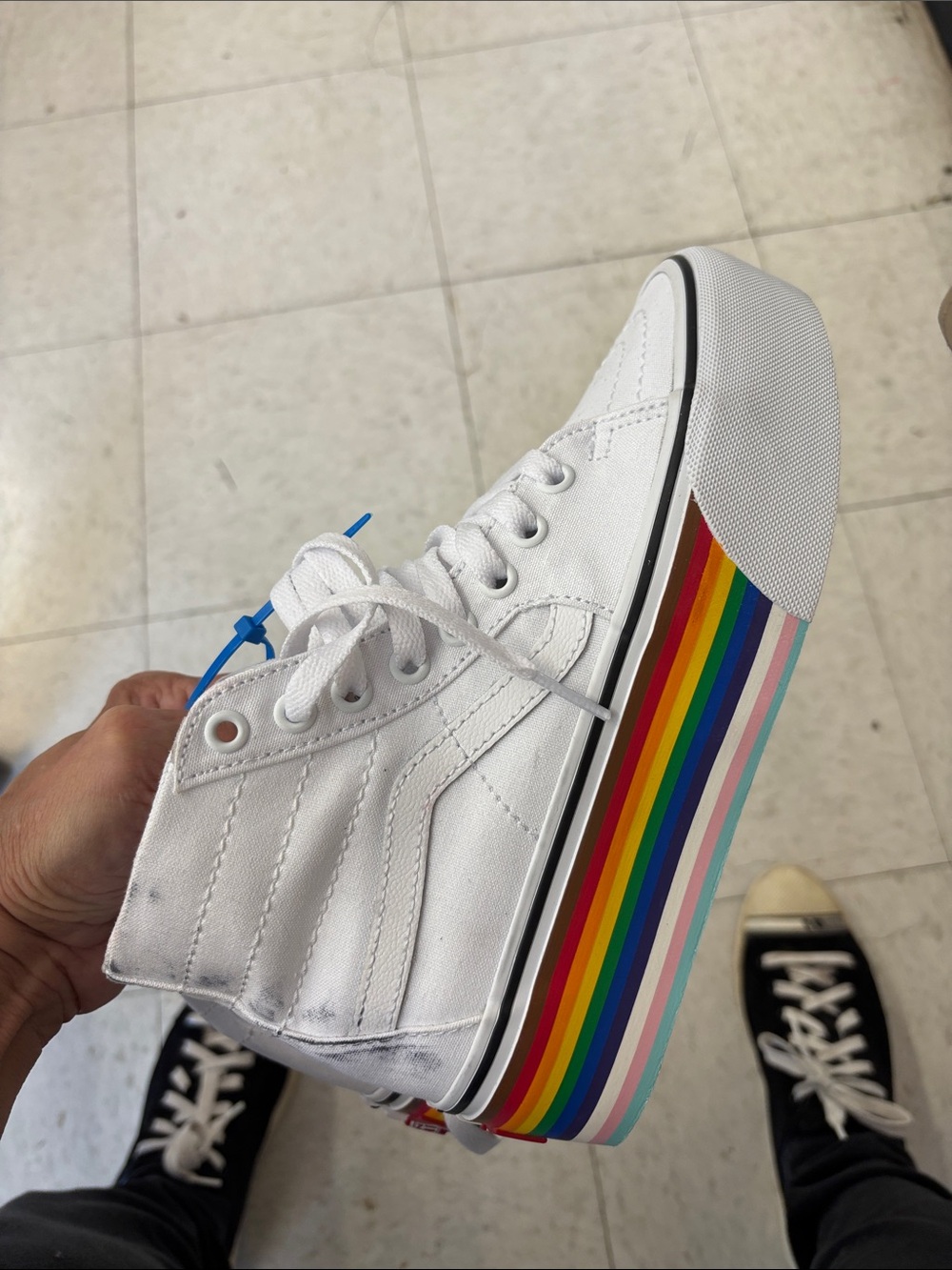 Vans White Canvas High-Top Sneaker with Rainbow Stripe Sole